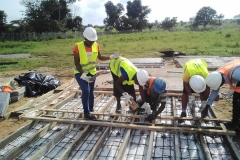 FUAM-SITE-STEM-FEMALE-STUDENT-TAKING-PART-IN-THE-ONGOING-CASTING-OF-THE-CABLE-TRENCH-FOUNDATION-PRE-CAST-SLAB