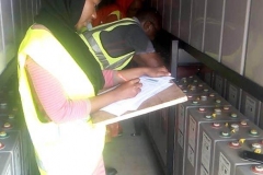 BUK-STEM-students-their-supervisor-measuring-and-recording-battery-voltage