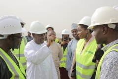Hon. Minister asking questions during the site tour