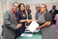 MD-CEO, REA with university representatives at the MoU Signing Ceremony