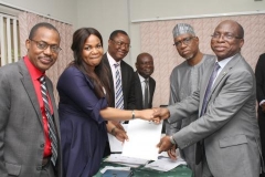 MD-CEO, REA with university representatives at the MoU Signing Ceremony