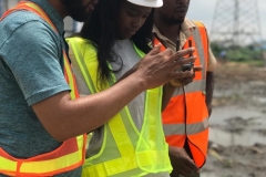 UNILAG-A student being taught how to take aerial shots of the site with a drone.