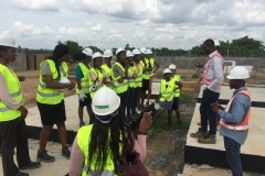 STEM students receiving safety briefing at the project site from METKA representatives