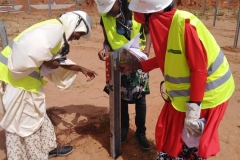 UDUS-STEM-Students-checking-the-verticality-of-the-driven-pillars-using-spirit-level-instrument-during-site-tour