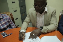 Engr. Timothy Signing the Site Handover Form