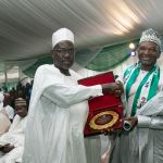 H.E Muhammed Mahmoud, Honourable Minister of Environment receiving an award from Prof. Muhammad Yahuza Bello VC BUK